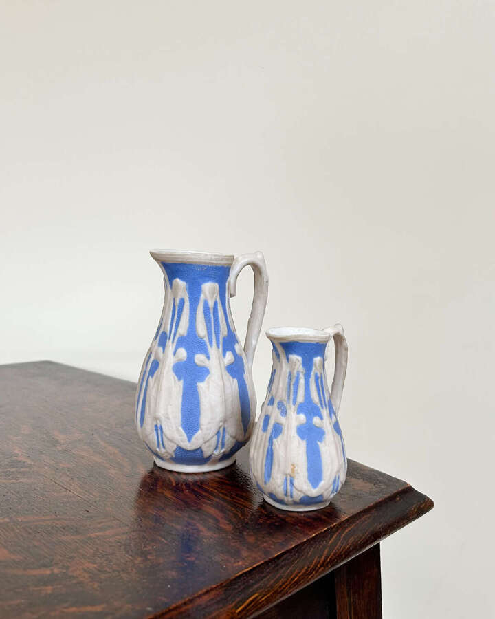 Pair of Parian Relief Jugs | Blue & White Floral Moulded Ceramic &ndash; Large & Small